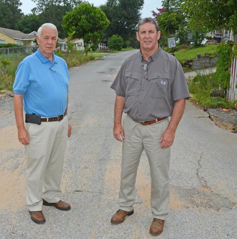Haleyville Mayor Ken Sunseri, left, and Lane Bates, general manager of the Haleyville Water and Sewer Department, are on 7th Avenue, where a  portion of the proposed major water/sewer line project will take place.