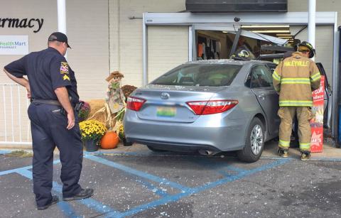 A car crashes into the entrance of Goar's Market in Haleyville.