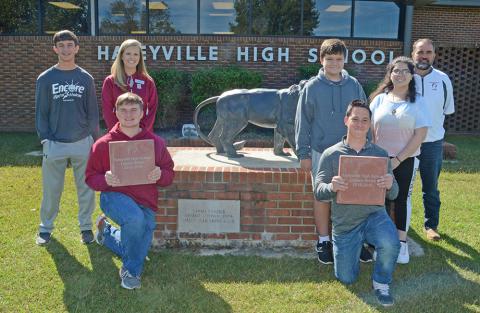 From left, back, student Dylan Kutis, HHS Principal Dr. Erika McCoy, students Jay Cook, Rosa Esparza and Instructor Jamie White. Front, students Trent McNutt and Graham Long.
