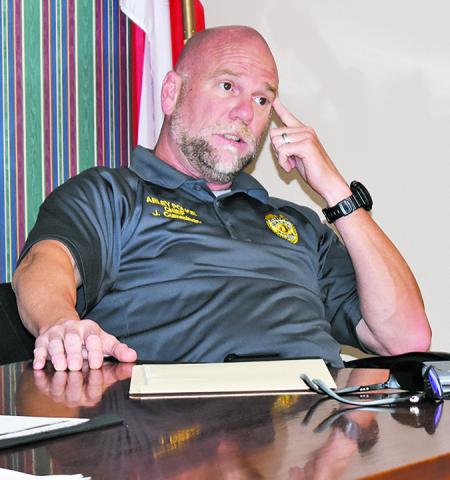 Police Chief Jerry Cummings speaks to the town council about a grant the Arley Police Department could use to purchase equipment needed. The amount of the grant, if the department qualifies, will be $24,000.