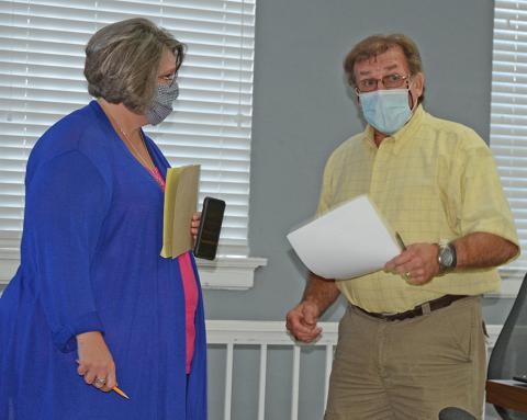 Winston County Probate Judge Sheila Moore and Winston County Commission Chairman Roger Hayes discuss the mask ordinance after the commission meeting.