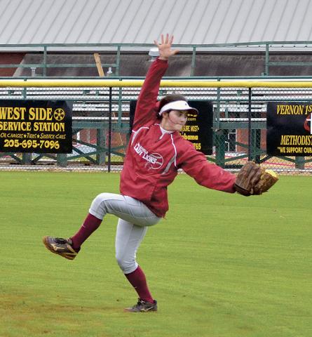 Shown is Mallory Rushing making an aerobatic catch at second base.