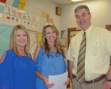 Addison Elementary Principal Jeff Scott with Pre-kindergarten teacher Liz Brannon, far left, and Jennifer Woodard. who were funded under the first pre-K program.