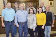 Haleyville council members, front row from left, Jonathan Bennett and Royce Benefield stand with new accounting clerk Caroline Thompson and Christy Harbin, acting city clerk and G. Blue Russell, councilman. Back row are councilmen Richard Bittinger and Drew Thrasher with Ken Sunseri, mayor.