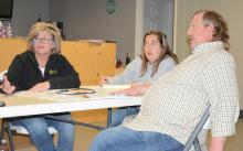 Bear Creek Mayor Tammie Batchelor discusses the need to move Town Clerk Jamie Green, center, to water clerk and post the position for a town clerk. Also shown is Attorney Cole Christopher.