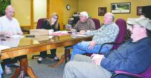 Mayor Elmo Robinson declares two council seats vacant: Bill Hawkins’, deceased, and Bart Seymour’s. From left are Adam Veal, council member; Kim Ownby, city clerk; Robinson, Hobby Walker, council member and Seymour.