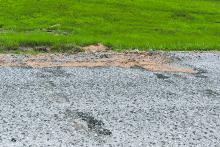 A 1,200 foot section of County Road 8 will be fixed before striping. The road will be complete at this point.