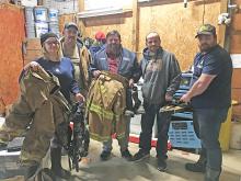 Members of the Delmar Volunteer Fire Department display some of their equipment, which was so precious to obtain due to lack of funding, yet is, in some cases, becoming outdated.  From l-r:  Zena Ingram, Assistant Chief Keith Tolkacevic, James Liverett, Chief Ray Cantrell and Jarrett Stidham.