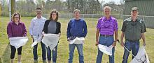 Preparing for the community clean up, from left, Amy Ackley, member of both the Arley Women’s Club and Rotary Club of Smith Lake; David Kelly, Beverly Kelly, AWC; Arley Fire Chief James Rickett; Wade Weeks, treasurer of the RCOSL and Mark Pafford, Rotary club president.