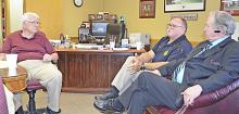 Double Springs Police Chief Kim Miller presents concerns for the need of more protective equipment, in the wake of a resurgence of mass shootings across the nation. Shown listening is Mayor Elmo Robinson. Seated beside Chief Miller is Winston County Circuit Clerk J.D. Snoddy.