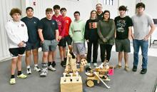 Members of the PHS engineering class pose with their robot GOOSE and a second robot, Squeaky. From l-r: Ethan Bailey, Cayden Gallardo, Hunter Lawrence, Brayden Ricketts, Noah Ward, Hunter Brewer, Morgan Lauderdale, Faculty Advisor David Copeland, Liliana Gallardo, River Poe and Zachary Farr.