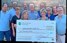 Pictured above from left to right.  Front row, Beth Sargent, AWC vice president and Laurie McGriff, AWC president.  Back row, from left, Daryl Calvert, James Fields, Lisa Weeks, Chad Alexander, David Hembree, Phillip Garrison, Lynda Carter, Sheila Sizemore and Robert Tidwell, Cullman Electric Board of Trustees members. (Courtesy Photo)  