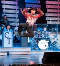 Rayce Cleghorn, of Addison, is kicking up his heels with joy, living his dream of being a professional musical performer, currently working at the Country Music Tonight Theater in Pigeon Forge, Tenn.  (Courtesy photo)