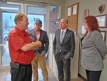 Officials discuss the recent Norfolk Southern train situation in the town of Lynn with U.S. Congressman Robert Aderholt. From left, Winston County Commissioners David Cummings and Rutger Hyche, Aderholt and Kelli Wolfe, district field representative for U.S. Senator Katie Britt.