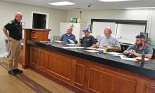Bear Creek Police Chief Eddie Collins talks to the town council about a new Explorer program that is starting at Phillips School. Council members, from left, Chris Warren, Tom Misner, Mayor Rob Taylor and  council member Eric Loden. Not pictured is council member Barry McCarley.
