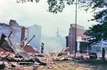 Smoke still rises from the rubble of the Haleyville Schools a day after the fire occurred. (Photo taken by now-NWA Senior Reporter Chad Fell in 1986.  Fell was a senior at Haleyville High School in 1986.)