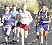 Pictured  are runners in the 4x800 relay, where Haleyville High School placed first at the track and field meet held at Russellville on Tuesday, March 13. Haleyville runner is Tristan Carter and the Winston County High School  competitor is Ryker Morgan.