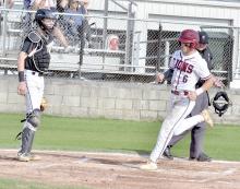 Scott McAlpine steps on homeplate for a solo homerun Thursday, April 11.